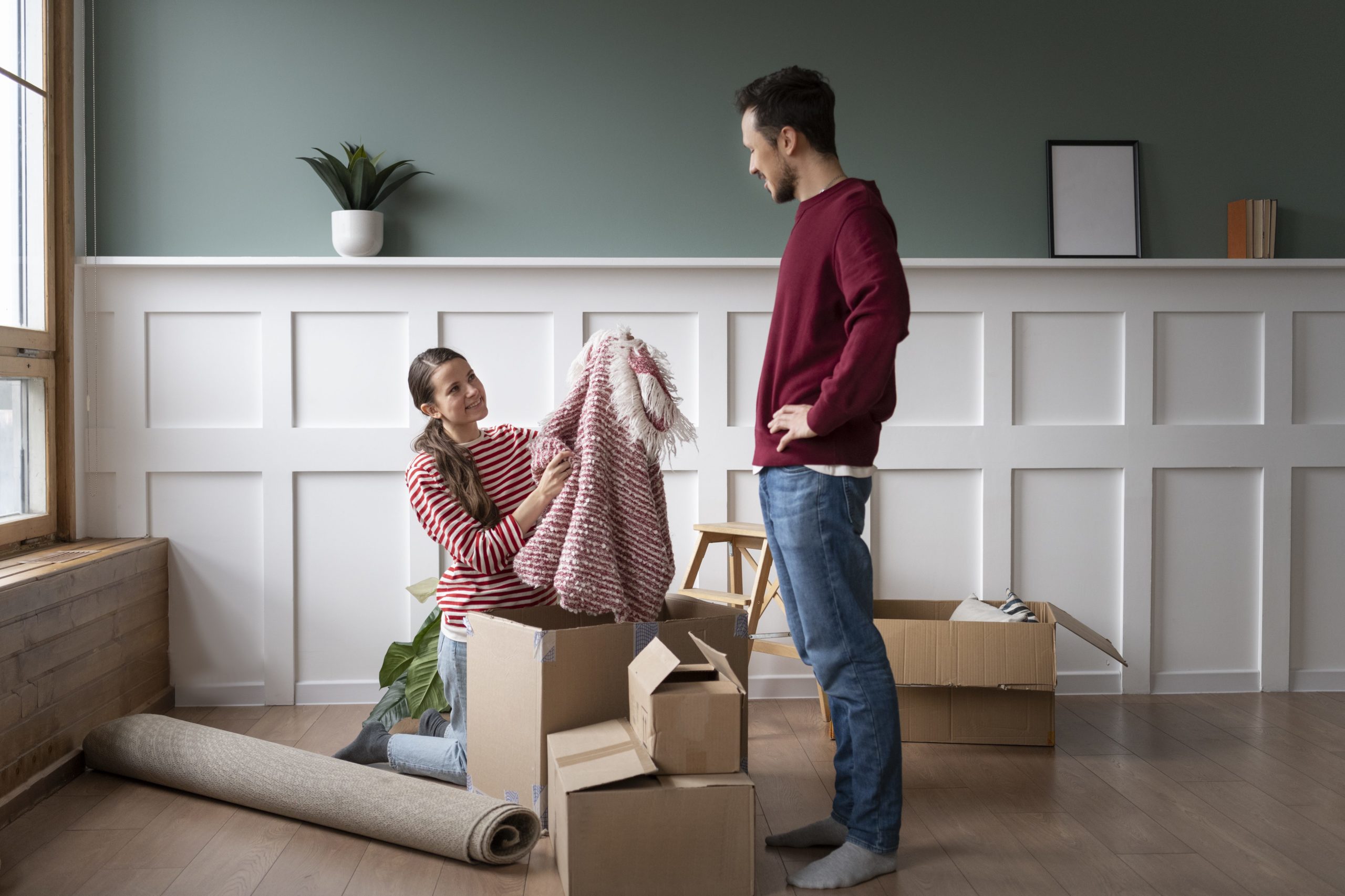 young-family-moving-into-new-home (1)